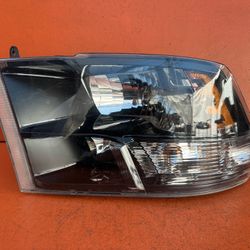 2009 - 2018 Dodge Ram 1500 Left Driver Side Halogen Headlight OEM 