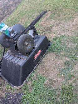 Hooks to riding lawnmower