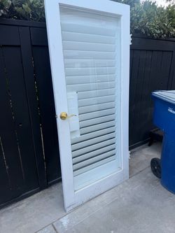 White Louvered Interior Door with Gold Knob