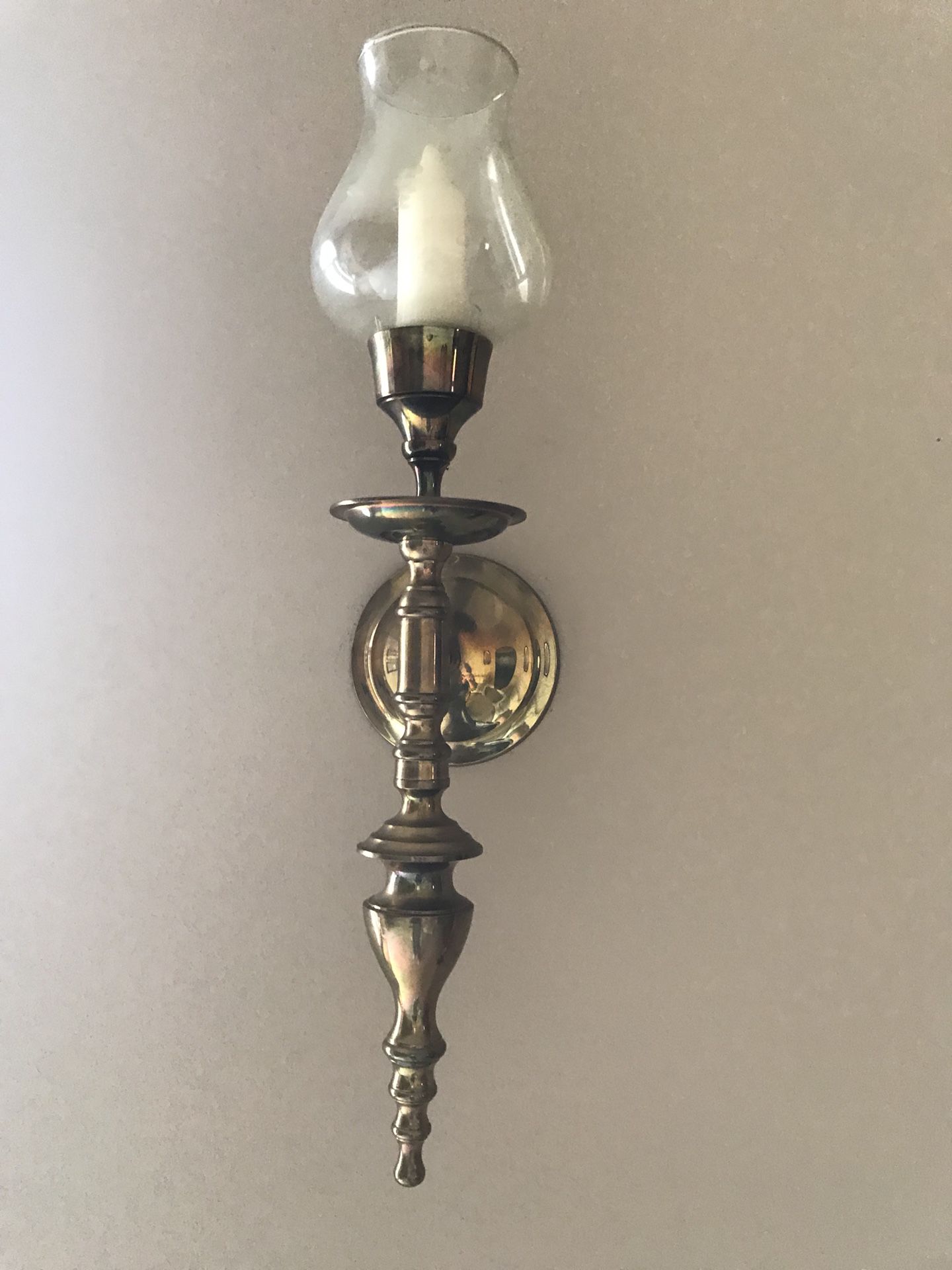 Brass and glass candle sconce