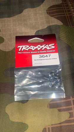 Traxxas 4mm Flanged Nylon Locking Steel Nuts (8) - 3647 - Slash Stampede Rustler