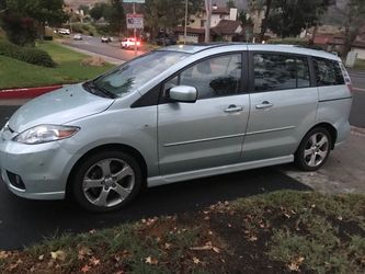2008 Mazda 5, low miles , sits 6 person, smog certified, registered, clean title, gas $aver,super reliable ,cute car