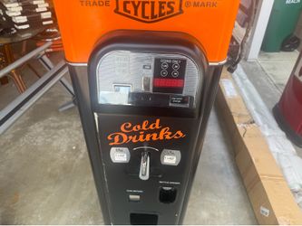 Harley Davidson coin operated soda vending machine gets cold dont know much about has bumps / bruises ,made by wurlitzer for Harley Davidson, what you