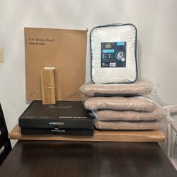 Garage sale, pallet of items, clearance sale, painting, heated blanket, shower, cushions, car sunshade