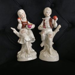 Boy and girl figurines 8” 