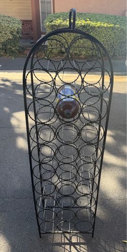 Cast iron wine or soda holder