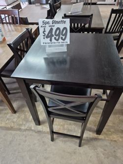 Table and four chairs