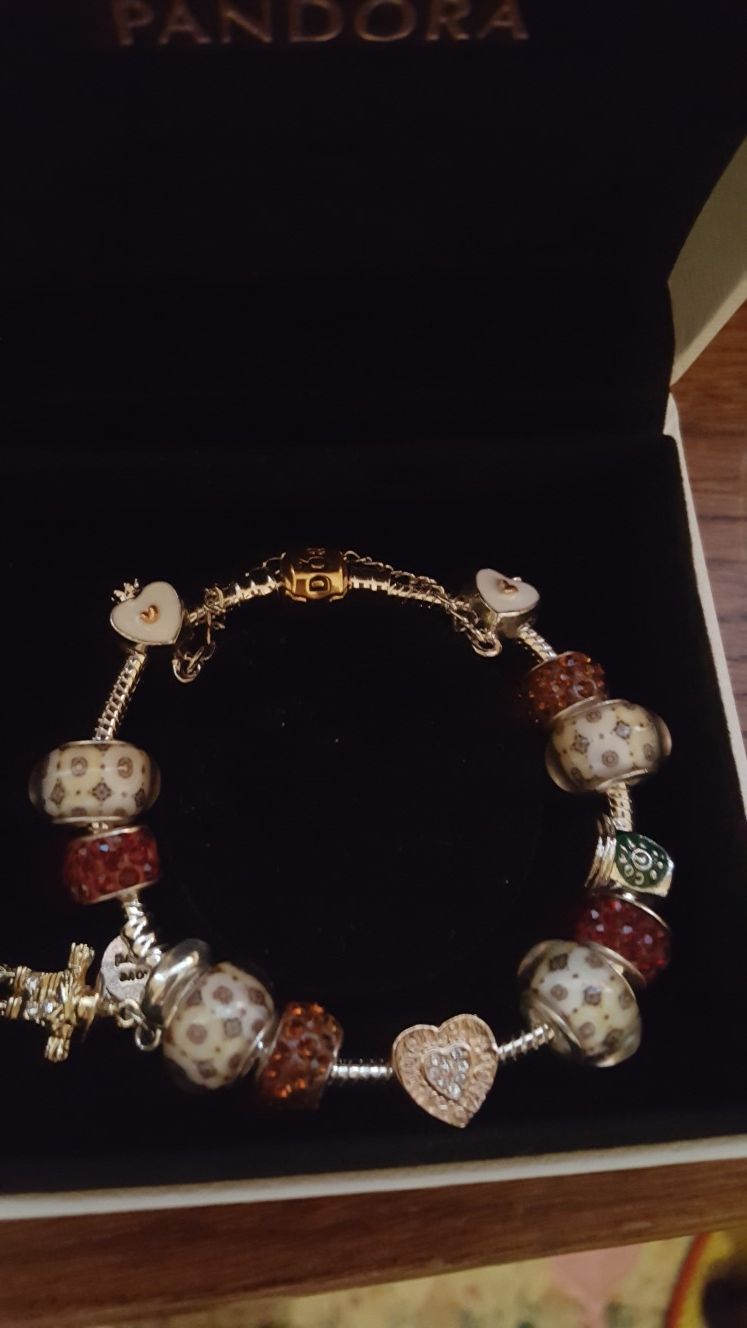 Pandora bracelet with charms and one authentic Pandora charm