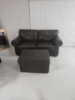 Leather Love Seat And Ottoman