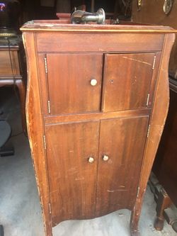 Antique Victrola record player and cabinet