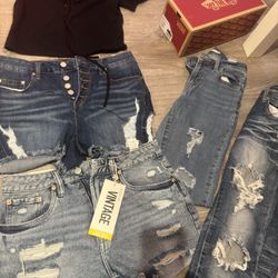 Different brands of pants, shorts, skirts, blouses, sizes S M L