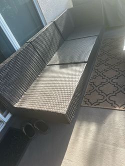 Wicker outdoor furniture with free rug pick up today