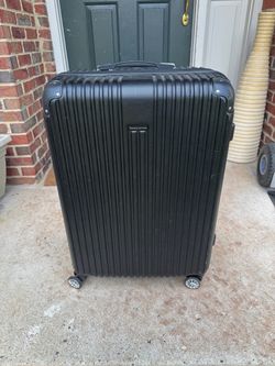 Traveler’s Choice Large Black Hardside Spinner Suitcase