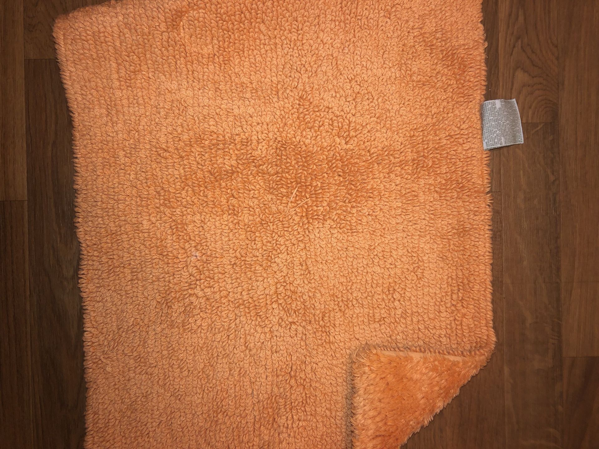 Orange bath mat