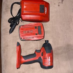 (Hilti).    impact drill battery and car charger