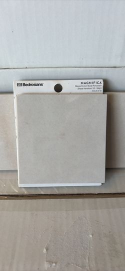 Four Boxes of 4 × 24 Polished Porcelain Tile – Bedrosian Bianco Lasa