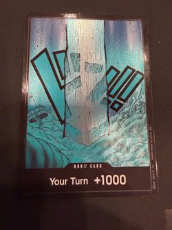 One Piece Card Game DON!! Card – “Your Turn +1000” with the blue manga-style alternate art