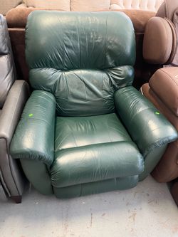 Green leather recliner (in store)