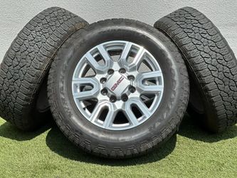 OEM 20” GMC Sierra 3500 Wheels Silver 8x180mm Sierra 2500 rims AT Goodyear tires LT275/65R20 
