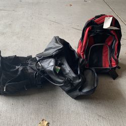 Luggage- New Red Travel Backpack, 2 Black Duffle Bags - One Faux Leather And One With Wheels!