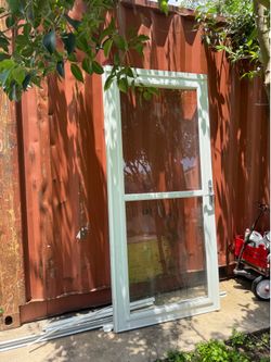 Weather door. 36 by 81.