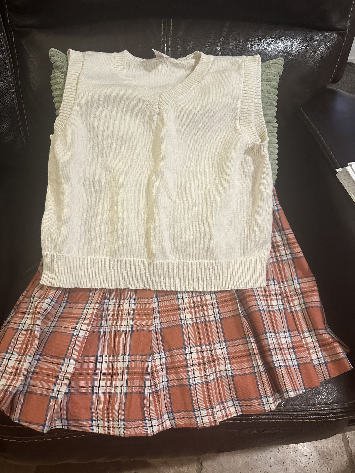 Pleated Skirt And Sweater Vest