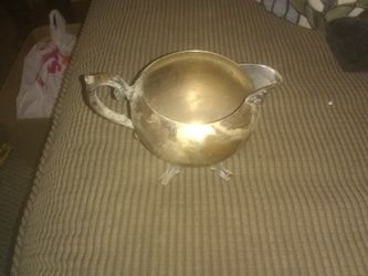Small silver antique tea kettle
