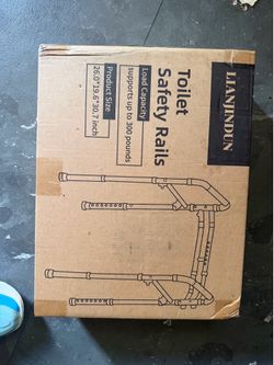 Toilet safety rail.