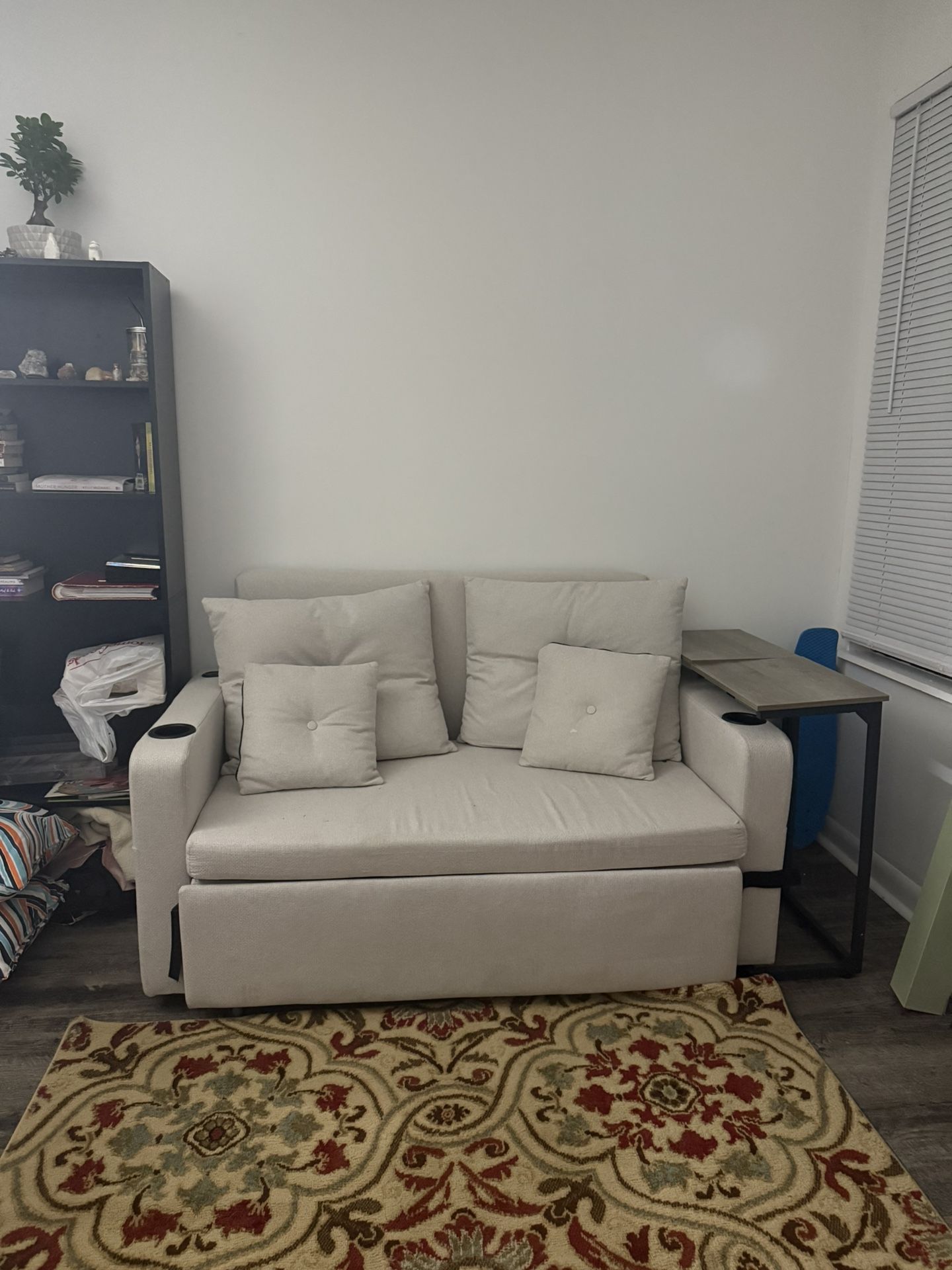 beige pull out love seat couch