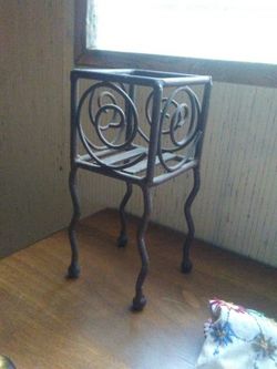 Wrought iron candle holder