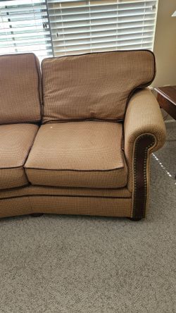 American Signature Goldne Color Couch.
