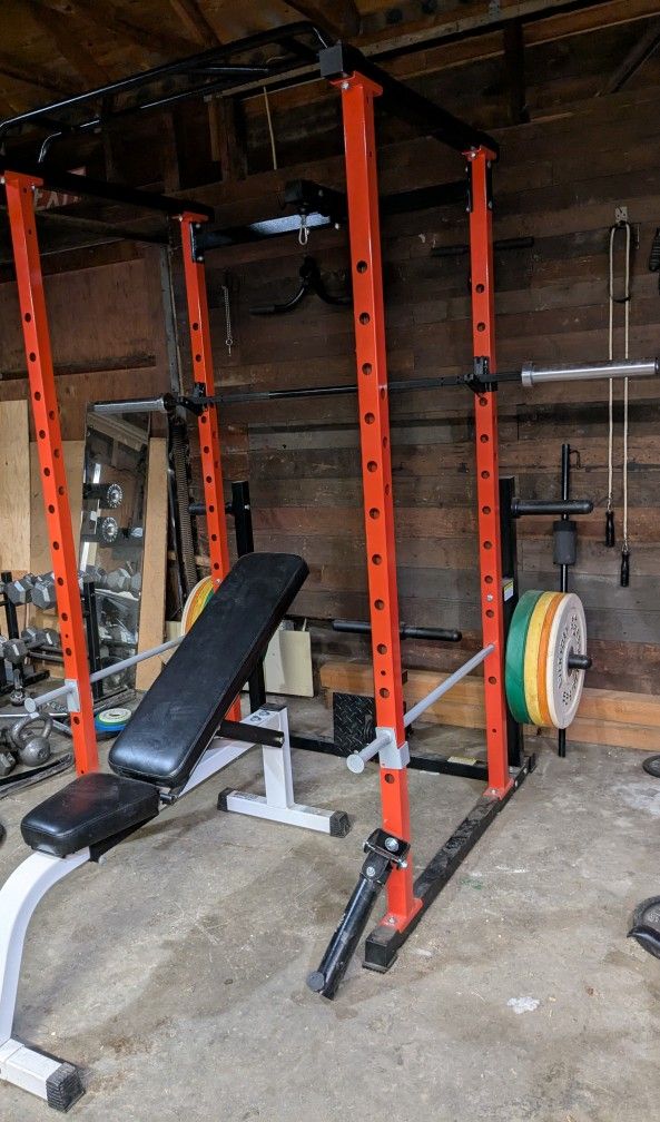 Weight Cage With Bench, Bar, Pulley, And Weights