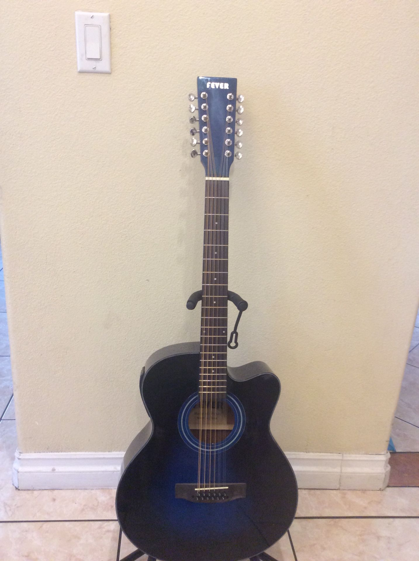 Fever 12 string electric acoustic guitar with built in tuner with soft case strap and cable