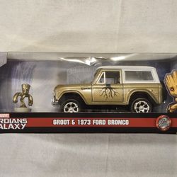 JADA METAL DIECAST 1:32 SCALE.  MARVEL GUARDIANS OF THE GALAXY.  1973 FORD BRONCO WITH METAL DIECAST GROOT FIGURE. 