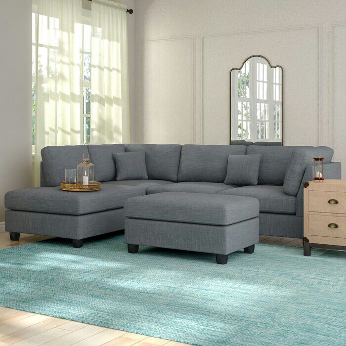 Grey Sectional with Cocktail Ottoman includes 2 seat sofa & reversible chaise lounge