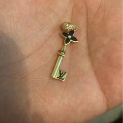 LV gold pendant 
