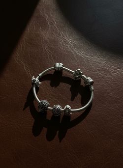 Real Silver Pandora charm Bracelet With 6 Charms Attached