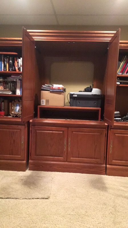 Entertainment center with side bookshelves