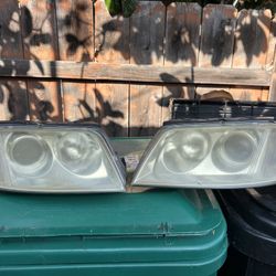 **CURB ALERT**FREE** ‘03 VW Passat Headlights 