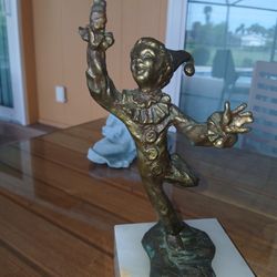 Bronze Clown Holding Orange Lucite Balloons