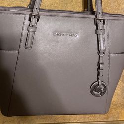 Michael Kors -Gray purse! Near new condition! Only carried for 2 months
