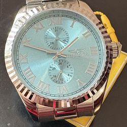 Invicta watch with a silver band and 