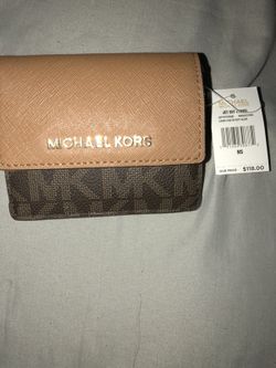 new michael kors bag (wallet) $ 80 or better offer (reasonable offers please thanks)