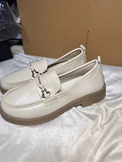 Cream leather loafers with gold hardware