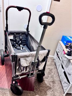 Baby’s stroller ruling cart  beach cart  outside  toys gray  very clean and like new