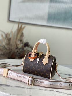 A classic brown crossbody bag perfect for any occasion. 