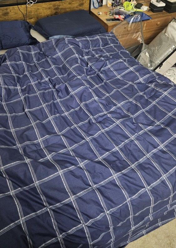 Navy blue and white checkered comforter