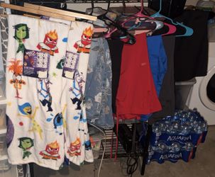 Blankets/ woman’s Clothes 