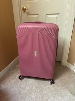 Medium pink suitcase