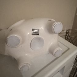 Small white polkadot piggy bank